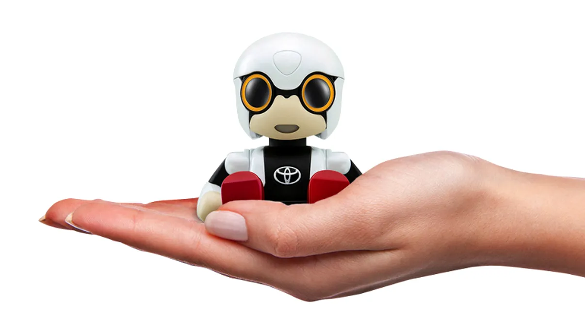 Robotul de la Toyota este partenerul de drum care încape în suportul pentru pahar