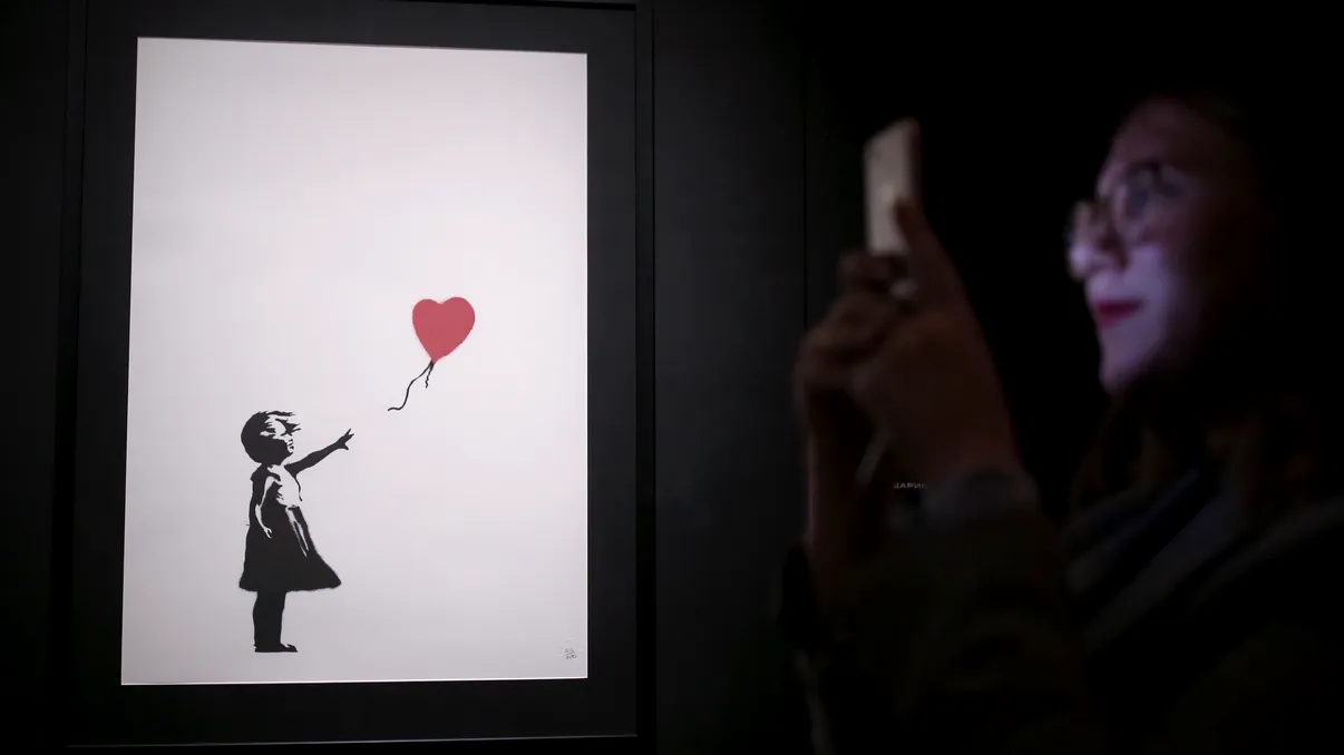 Preț record pentru un tablou, la licitație: cu cât a fost vândută ”Fata cu balon”, pictura 