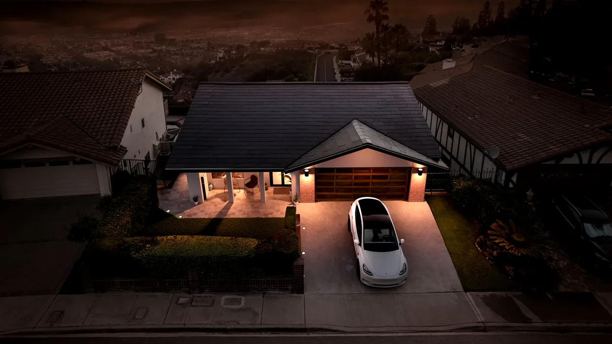 Ofertă ciudată pentru vânzarea unei case. Cumpărătorul va primi gratuit o Tesla de 70.000 de dolari