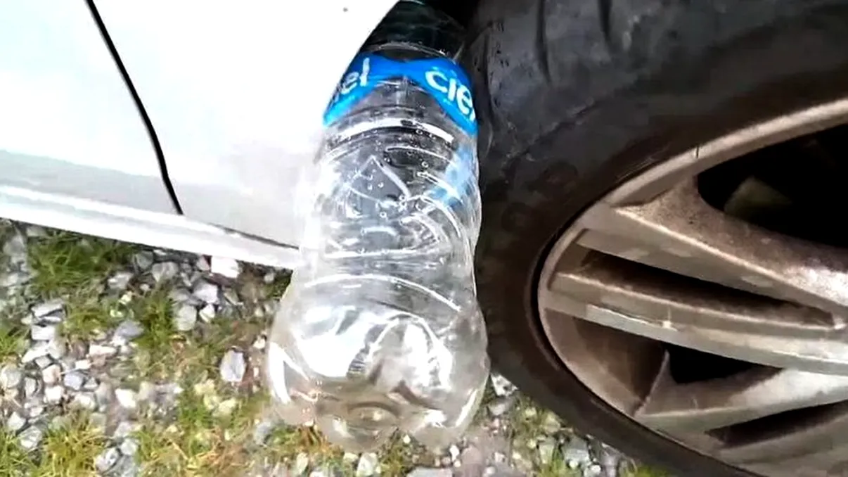 Atenție, șoferi! Ce înseamnă dacă găsești o sticlă cu apă la roata mașinii