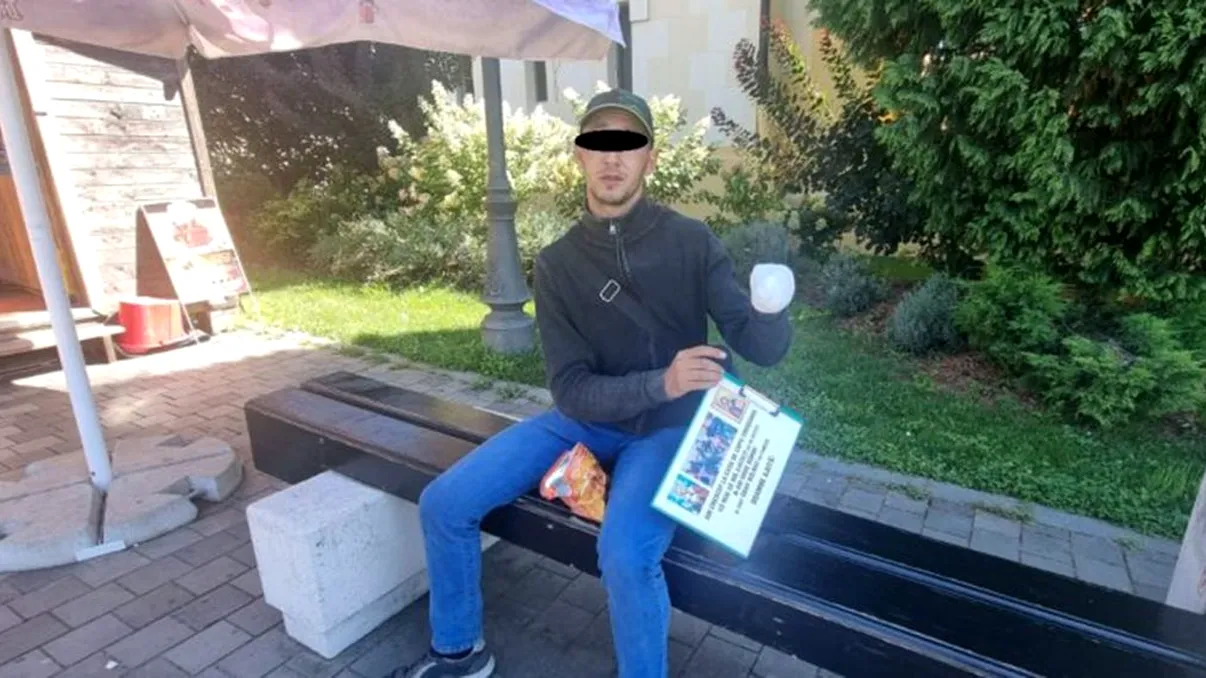 Cerșetor prins de polițiști cu un telefon în valoare de 1.000 euro. Cum înșela trecătorii pentru a primi bani