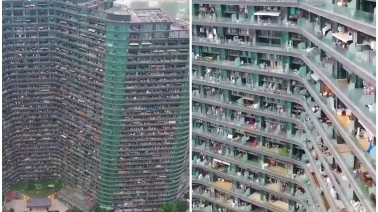 Blocul în care locuiesc peste 20.000 de oameni. Unii cred că este ca în Infern, dar nu e deloc aşa: are piscină, restaurante şi bănci