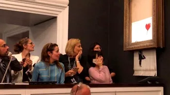 VIDEO Un tablou de Banksy s-a autodistrus după ce a fost câștigat la licitație