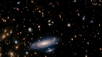 Telescopul James Webb surprinde o galaxie asemănătoare Căii Lactee, aflată la un miliard de ani lumină distanță