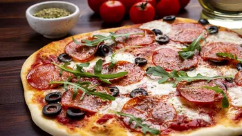 Surpriză pe bonul de plată: un client a fost taxat 50 de cenți pentru piperul negru presărat pe pizza, într-un restaurant din Italia