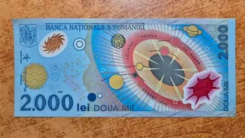 Mai ai bancnota de 2.000 de lei cu eclipsa din 1999? Cât valorează astăzi și ce exemplare caută colecționarii