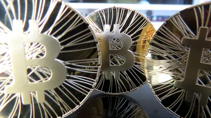 Apple se „împrietenește“ cu monedele digitale și acceptă prima aplicație pentru Bitcoin