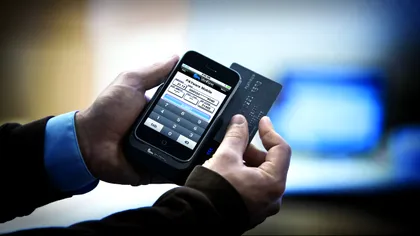 Românilor nu le mai este frică să plătească de pe mobil