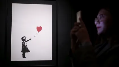 Preț record pentru un tablou, la licitație: cu cât a fost vândută ”Fata cu balon”, pictura 