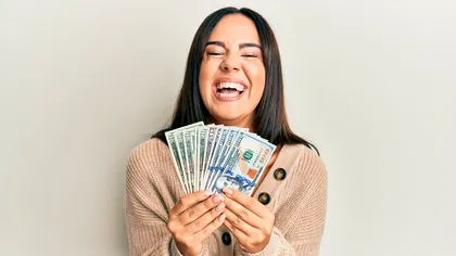 Pot banii să cumpere fericirea? Ce arată un nou studiu: participanților li s-au oferit 10.000 de dolari