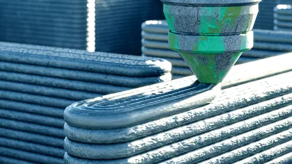 Cât costă o casă construită la imprimantă 3D, în cât timp record e gata. Maşinăria foloseşte un amestec inovator