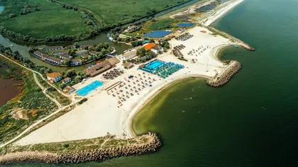 Plaja secretă a României, o bijuterie. Are nisip alb, nu este aglomerată, iar apa este curată