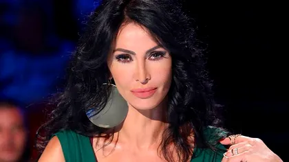 Mihaela Rădulescu, în public în România, după moartea lui Felix Baumgartner. A apărut zâmbitoare şi într-o rochie superbă. Foto