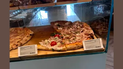 Cât a ajuns să coste o pizza pe aeroportul din Otopeni: şi străinii se uită ciudat la preţurile exagerate