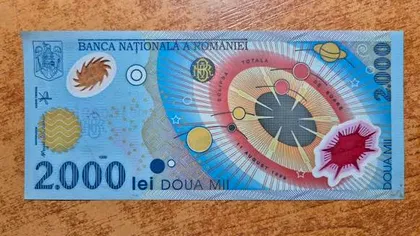 Mai ai bancnota de 2.000 de lei cu eclipsa din 1999? Cât valorează astăzi și ce exemplare caută colecționarii