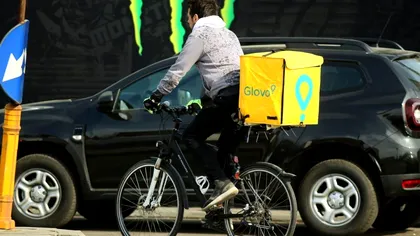 Câți bani poți câștiga, de fapt, la Glovo, livrând mâncare pe bicicletă