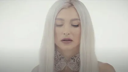 Andreea Bălan, filmată topless împreună cu un bărbat misterios. Replică dură pentru George Burcea