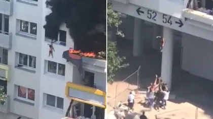 Video. Imagini desprinse din filmele de groază. Doi copii au sărit de la balcon după ce apartamentul în care locuiau a luat foc. Ce s-a întâmplat după aceea