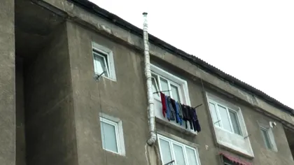 Orașul din România în care oamenii se încălzesc cu lemne, la bloc. Toți românii merg aici la tratamente