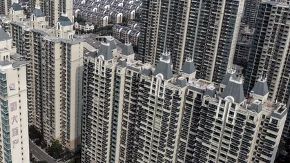 Apocalipsa imobiliară e pe cale să devină realitate. O nouă companie a intrat în criză cu datorii colosale în China