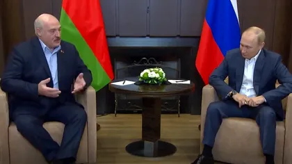 Detaliul care apare în timp ce Vladimir Putin este îmbărbătat de prietenul său în legătură cu rușii care fug de înrolare VIDEO